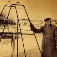 Robert Goddard with the world's first liquid-fueled rocket in Auburn, Massachusetts, in the year 1926.
