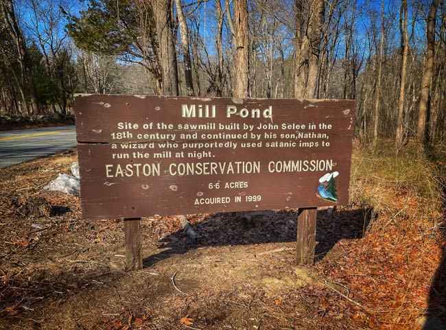 Nathan Selee's Satanic Mill Pond sign in Easton, Massachusetts. Photo by Jeff Belanger,