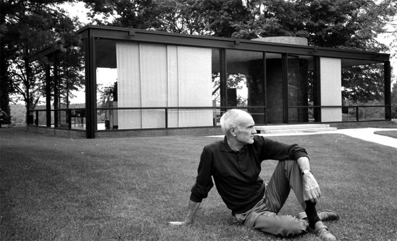 Architect Philip Johnson by his Glass House in New Canaan, Connecticut.