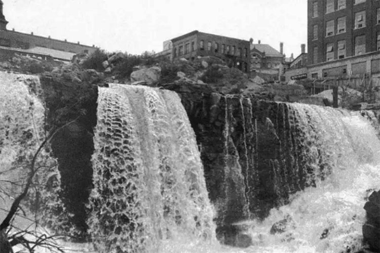 Historic photo of the Quequechan River falls in Fall River, Massachusetts.