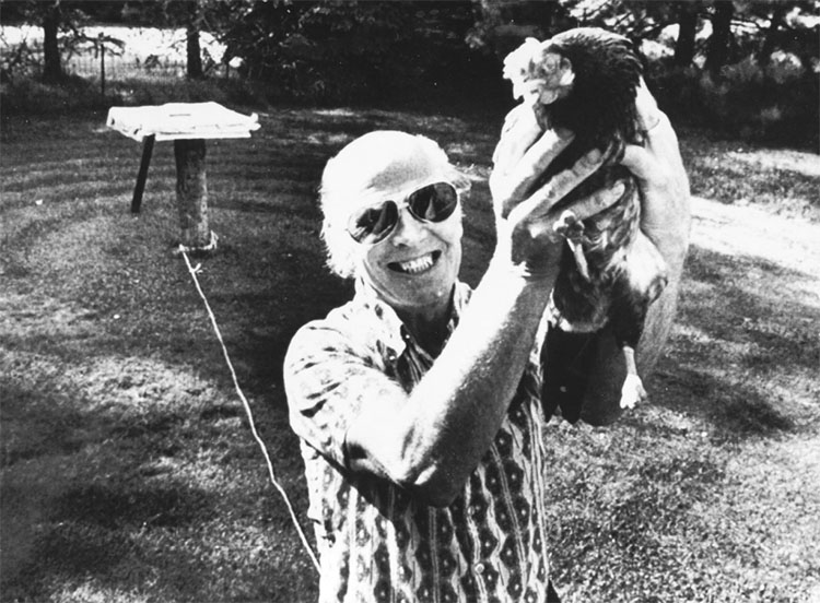 Edwin Robinson with his pet chicken Tuck Tuck shortly after lucky lightning strike.